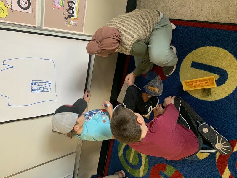 Students solving a math problem together