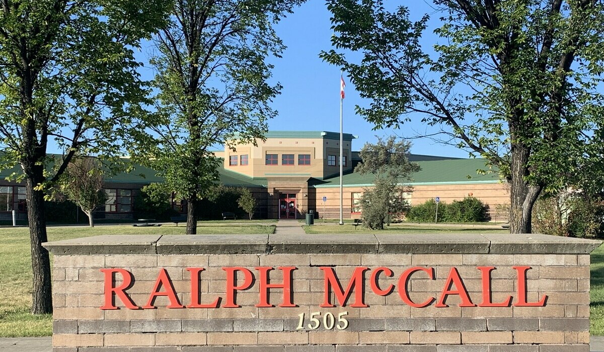 Ralph McCall School with the school sign in front